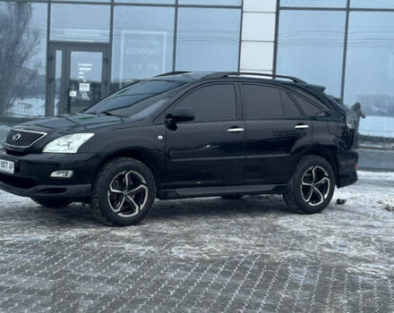 Черный Лексус РХ, объемом двигателя 3.46 л и пробегом 195 тыс. км за 11950 $, фото 2 на Automoto.ua