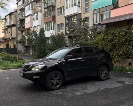 Черный Лексус РХ, объемом двигателя 3.5 л и пробегом 214 тыс. км за 14500 $, фото 1 на Automoto.ua