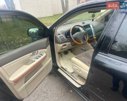 Черный Лексус РХ, объемом двигателя 3.46 л и пробегом 220 тыс. км за 12800 $, фото 5 на Automoto.ua