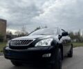 Черный Лексус РХ, объемом двигателя 3.5 л и пробегом 243 тыс. км за 11500 $, фото 1 на Automoto.ua