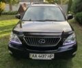 Черный Лексус РХ, объемом двигателя 3.46 л и пробегом 310 тыс. км за 11500 $, фото 1 на Automoto.ua