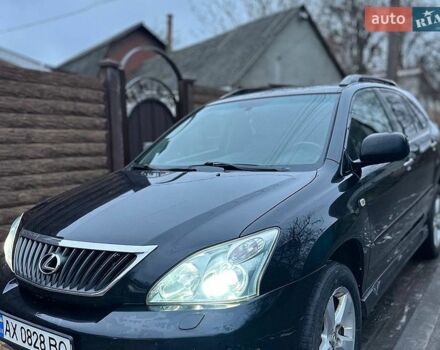 Черный Лексус РХ, объемом двигателя 3.46 л и пробегом 296 тыс. км за 9500 $, фото 1 на Automoto.ua