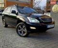 Черный Лексус РХ, объемом двигателя 3.46 л и пробегом 256 тыс. км за 11350 $, фото 1 на Automoto.ua
