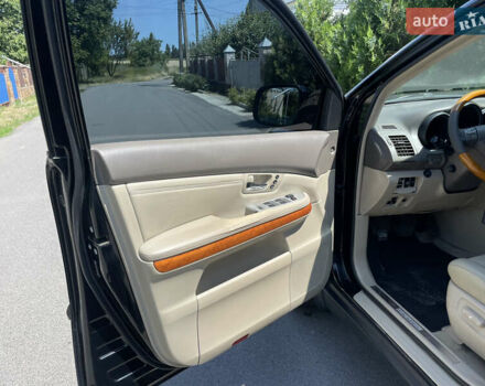 Черный Лексус РХ, объемом двигателя 3.46 л и пробегом 277 тыс. км за 9300 $, фото 5 на Automoto.ua