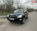 Черный Лексус РХ, объемом двигателя 3.46 л и пробегом 106 тыс. км за 12700 $, фото 1 на Automoto.ua