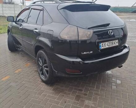 Черный Лексус РХ, объемом двигателя 3.46 л и пробегом 270 тыс. км за 9700 $, фото 3 на Automoto.ua
