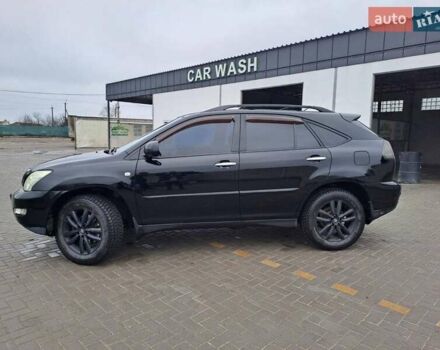 Черный Лексус РХ, объемом двигателя 3.46 л и пробегом 270 тыс. км за 9700 $, фото 1 на Automoto.ua