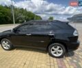 Черный Лексус РХ, объемом двигателя 3.3 л и пробегом 246 тыс. км за 13300 $, фото 1 на Automoto.ua