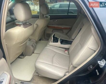 Черный Лексус РХ, объемом двигателя 3.46 л и пробегом 220 тыс. км за 12800 $, фото 3 на Automoto.ua