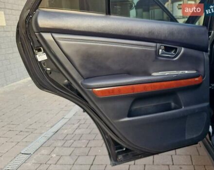 Черный Лексус РХ, объемом двигателя 3.46 л и пробегом 256 тыс. км за 11350 $, фото 40 на Automoto.ua