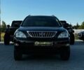 Черный Лексус РХ, объемом двигателя 3.5 л и пробегом 203 тыс. км за 10792 $, фото 1 на Automoto.ua