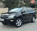 Чорний Лексус РХ, об'ємом двигуна 3.46 л та пробігом 233 тис. км за 13000 $, фото 1 на Automoto.ua