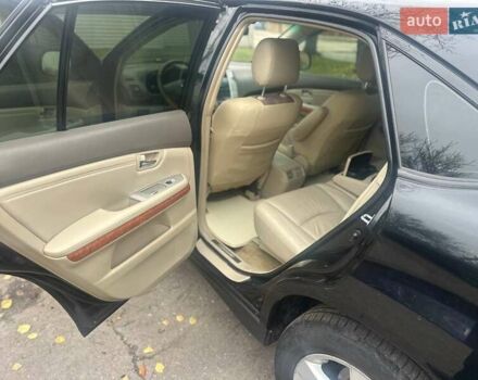 Черный Лексус РХ, объемом двигателя 3.46 л и пробегом 220 тыс. км за 12800 $, фото 2 на Automoto.ua