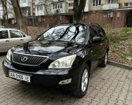 Черный Лексус РХ, объемом двигателя 3.5 л и пробегом 255 тыс. км за 12000 $, фото 1 на Automoto.ua