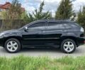 Черный Лексус РХ, объемом двигателя 3.3 л и пробегом 248 тыс. км за 12500 $, фото 1 на Automoto.ua