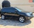 Черный Лексус РХ, объемом двигателя 3.46 л и пробегом 235 тыс. км за 13000 $, фото 1 на Automoto.ua