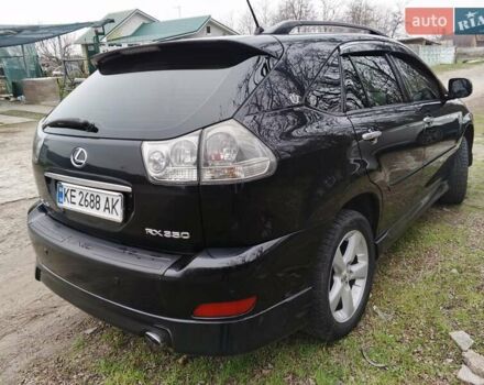 Черный Лексус РХ, объемом двигателя 3.46 л и пробегом 250 тыс. км за 11700 $, фото 1 на Automoto.ua