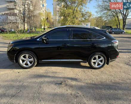 Черный Лексус РХ, объемом двигателя 3.5 л и пробегом 200 тыс. км за 16500 $, фото 1 на Automoto.ua
