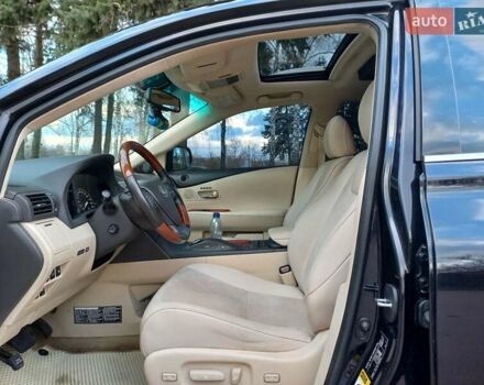 Черный Лексус РХ, объемом двигателя 3.46 л и пробегом 125 тыс. км за 21700 $, фото 1 на Automoto.ua