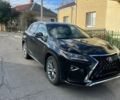 Чорний Лексус РХ, об'ємом двигуна 2 л та пробігом 200 тис. км за 24200 $, фото 1 на Automoto.ua