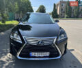 Черный Лексус РХ, объемом двигателя 3.46 л и пробегом 100 тыс. км за 33900 $, фото 1 на Automoto.ua