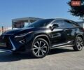 Чорний Лексус РХ, об'ємом двигуна 2 л та пробігом 138 тис. км за 30700 $, фото 1 на Automoto.ua