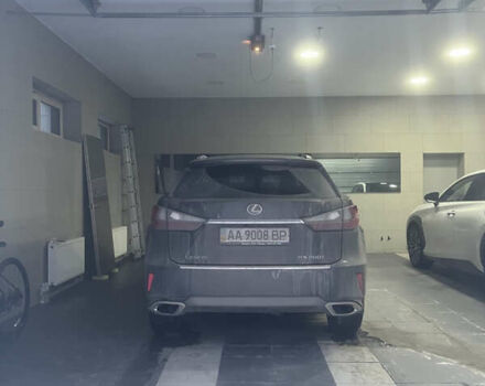 Черный Лексус РХ, объемом двигателя 2 л и пробегом 100 тыс. км за 39900 $, фото 1 на Automoto.ua