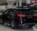 Черный Лексус РХ, объемом двигателя 2 л и пробегом 70 тыс. км за 34999 $, фото 2 на Automoto.ua