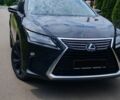 Чорний Лексус РХ, об'ємом двигуна 2 л та пробігом 215 тис. км за 26500 $, фото 1 на Automoto.ua
