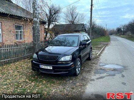 Черный Лексус РХ, объемом двигателя 3 л и пробегом 211 тыс. км за 5000 $, фото 1 на Automoto.ua