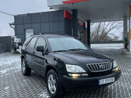 Черный Лексус РХ, объемом двигателя 3 л и пробегом 285 тыс. км за 5800 $, фото 1 на Automoto.ua