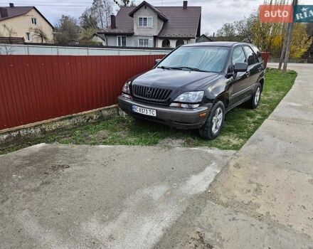 Черный Лексус РХ, объемом двигателя 3 л и пробегом 286 тыс. км за 5300 $, фото 1 на Automoto.ua