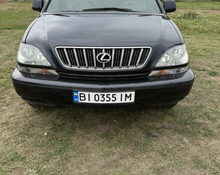 Черный Лексус РХ, объемом двигателя 2.99 л и пробегом 600 тыс. км за 5800 $, фото 1 на Automoto.ua