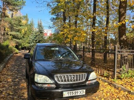Черный Лексус РХ, объемом двигателя 3 л и пробегом 270 тыс. км за 6000 $, фото 1 на Automoto.ua