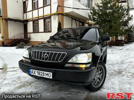 Черный Лексус РХ, объемом двигателя 3 л и пробегом 398 тыс. км за 5999 $, фото 1 на Automoto.ua