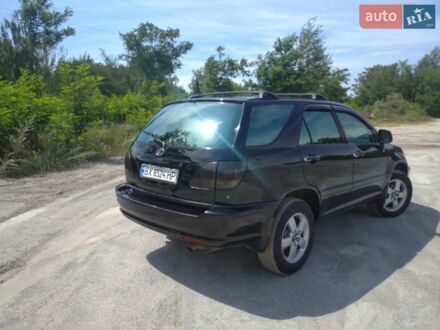 Чорний Лексус РХ, об'ємом двигуна 3 л та пробігом 324 тис. км за 8500 $, фото 1 на Automoto.ua