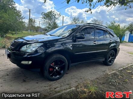 Черный Лексус РХ, объемом двигателя 3 л и пробегом 220 тыс. км за 9000 $, фото 1 на Automoto.ua