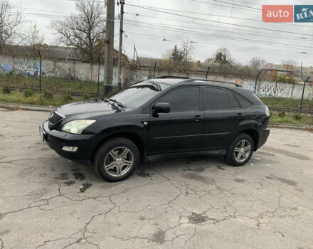 Черный Лексус РХ, объемом двигателя 3 л и пробегом 264 тыс. км за 8500 $, фото 1 на Automoto.ua