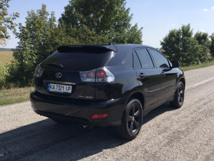 Черный Лексус РХ, объемом двигателя 3 л и пробегом 275 тыс. км за 9500 $, фото 1 на Automoto.ua