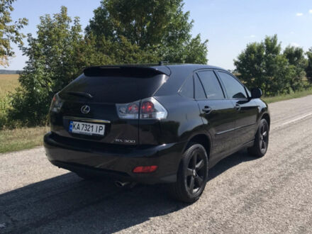 Чорний Лексус РХ, об'ємом двигуна 3 л та пробігом 275 тис. км за 8700 $, фото 1 на Automoto.ua