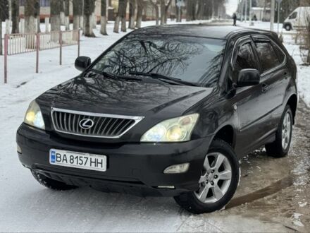 Черный Лексус РХ, объемом двигателя 2.4 л и пробегом 287 тыс. км за 6350 $, фото 1 на Automoto.ua