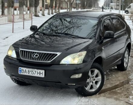 Черный Лексус РХ, объемом двигателя 2.4 л и пробегом 287 тыс. км за 6350 $, фото 1 на Automoto.ua