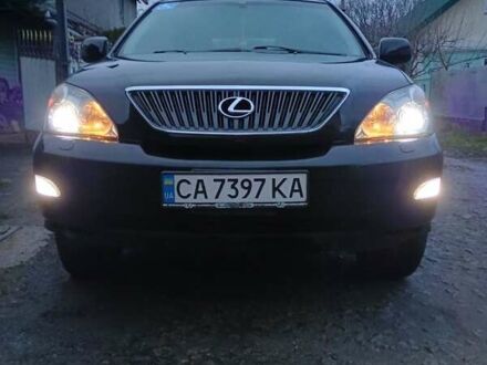 Черный Лексус РХ, объемом двигателя 3.5 л и пробегом 315 тыс. км за 11650 $, фото 1 на Automoto.ua