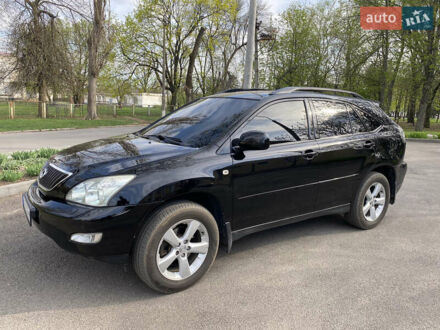 Черный Лексус РХ, объемом двигателя 3.5 л и пробегом 175 тыс. км за 13600 $, фото 1 на Automoto.ua