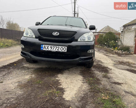 Черный Лексус РХ, объемом двигателя 3.5 л и пробегом 240 тыс. км за 11500 $, фото 1 на Automoto.ua