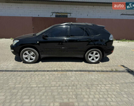 Черный Лексус РХ, объемом двигателя 3.46 л и пробегом 189 тыс. км за 10200 $, фото 1 на Automoto.ua