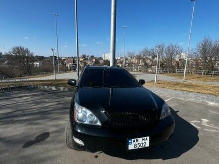 Черный Лексус РХ, объемом двигателя 3.46 л и пробегом 250 тыс. км за 11000 $, фото 1 на Automoto.ua