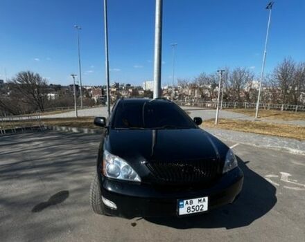 Черный Лексус РХ, объемом двигателя 3.46 л и пробегом 250 тыс. км за 11000 $, фото 1 на Automoto.ua