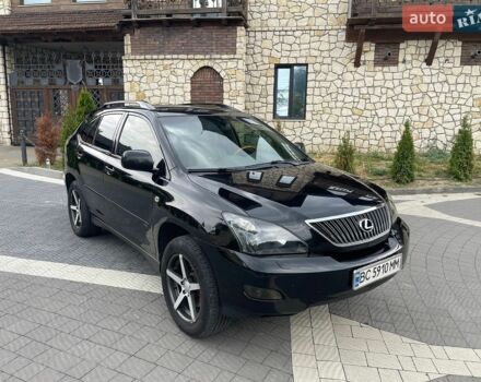 Черный Лексус РХ, объемом двигателя 3.46 л и пробегом 235 тыс. км за 11000 $, фото 1 на Automoto.ua