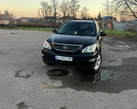 Черный Лексус РХ, объемом двигателя 3.5 л и пробегом 260 тыс. км за 13999 $, фото 1 на Automoto.ua
